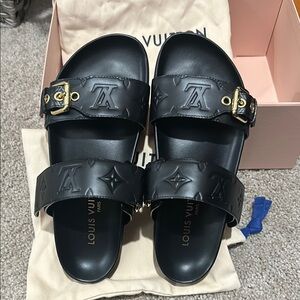 Louis Vuitton Black Sandals with Gold Accents